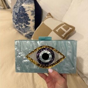 Eye Design Clutch with Gold and Purple Accents